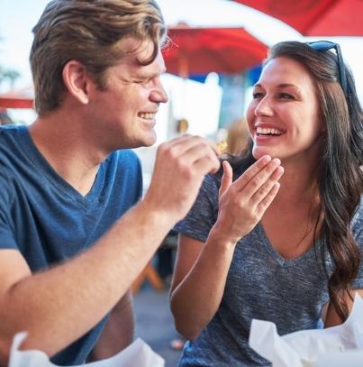 Couple laughing together at Jet Stream Waller RV Park in Houston Texas